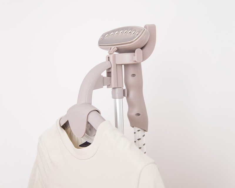 white crew-neck shirt on hanger